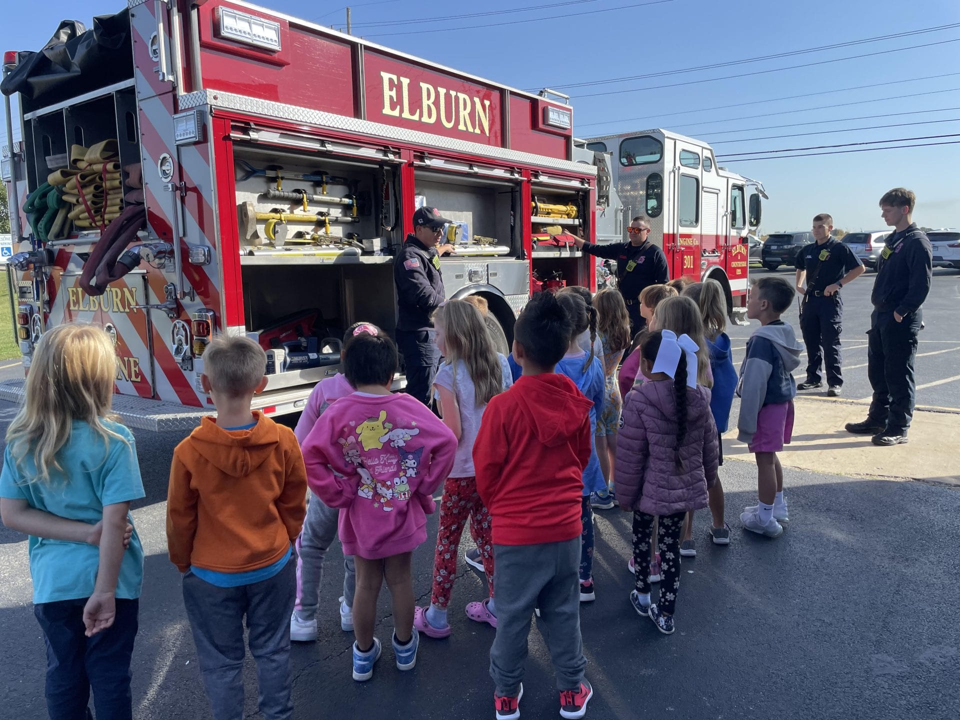 Students looking at fire truck