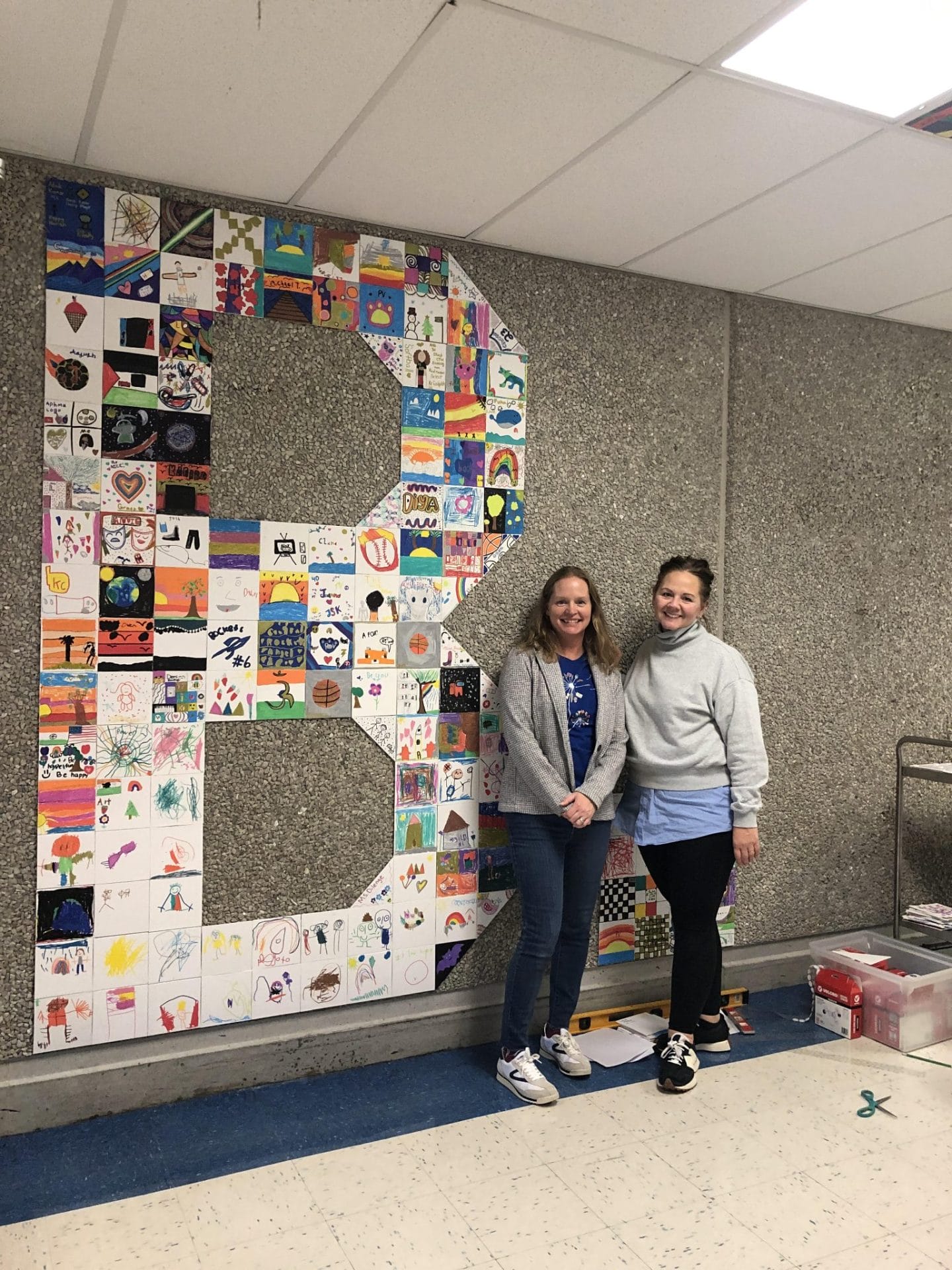 Teachers working on art project