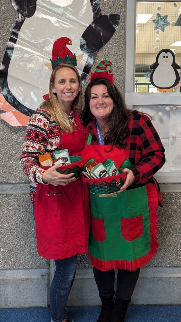 Elf PTO volunteers with hot cocoa