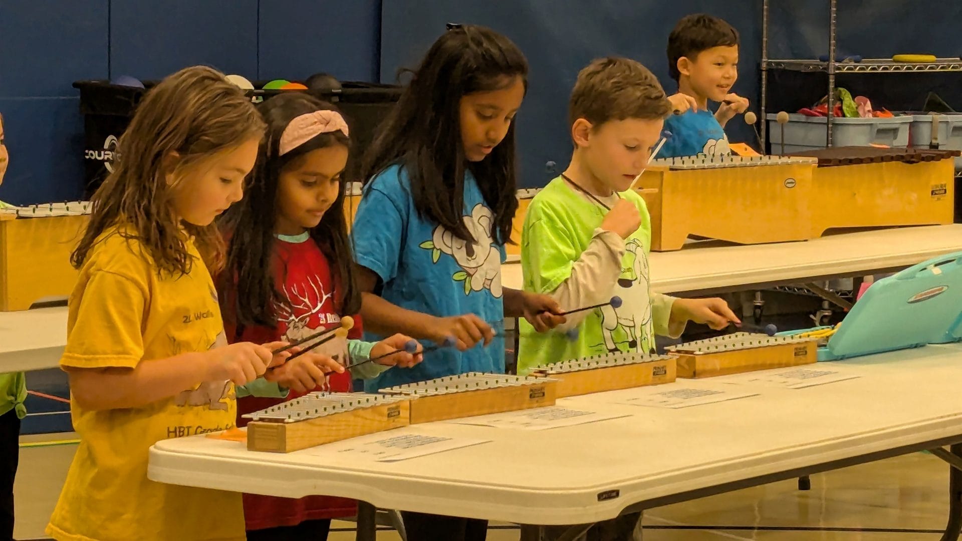 Kids playing instrument