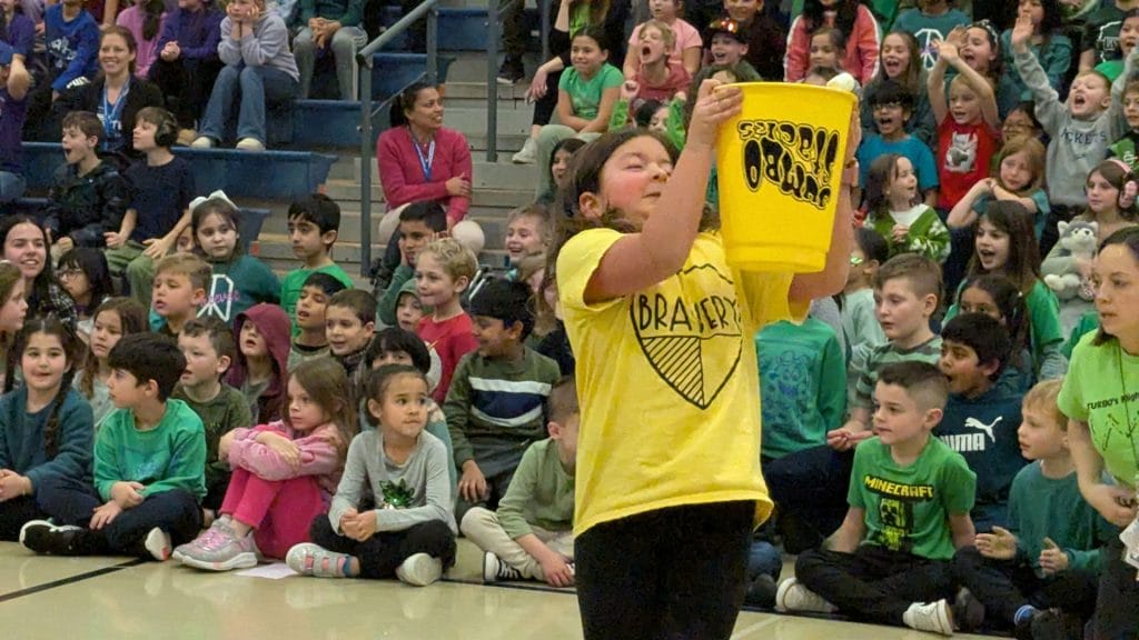 Girl holding bucket