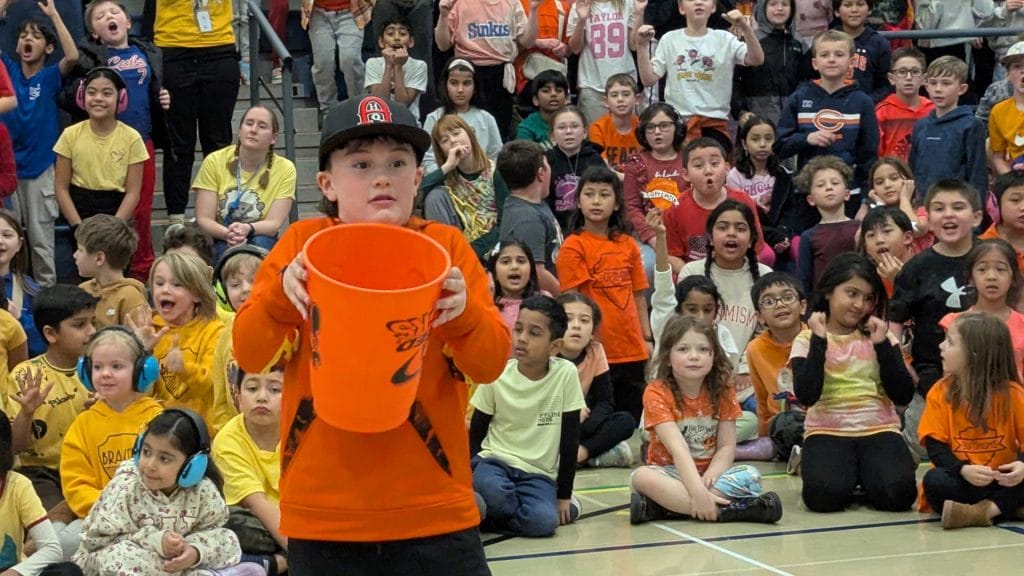 Boy holding bucket