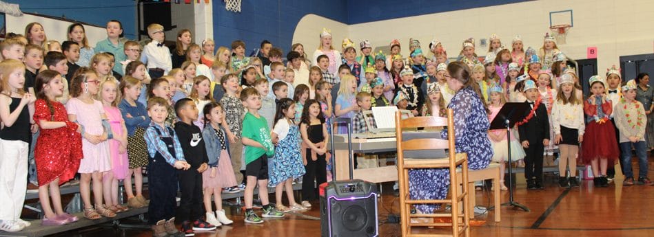 Students singing songs.