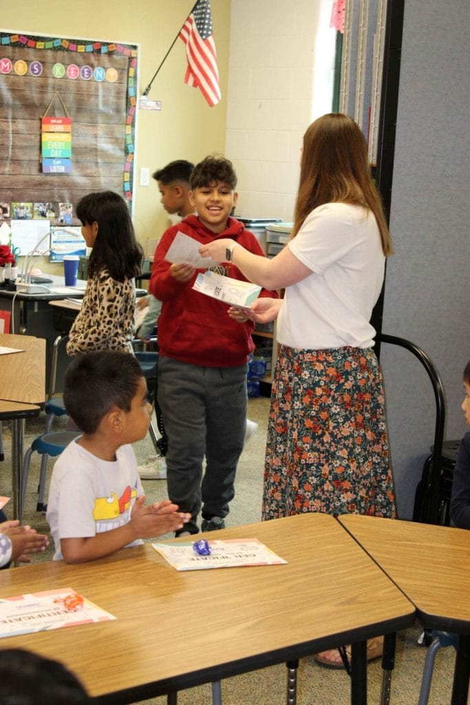 5th grader receiving certificate