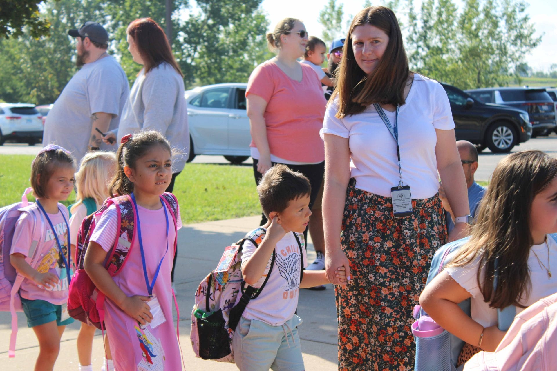 Students with teacher outside