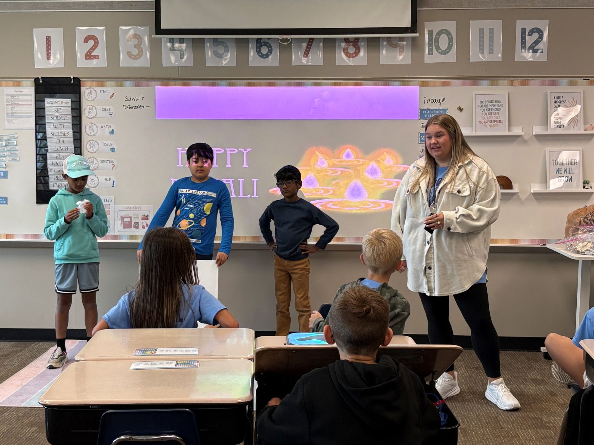 Students giving a presentation on Diwali