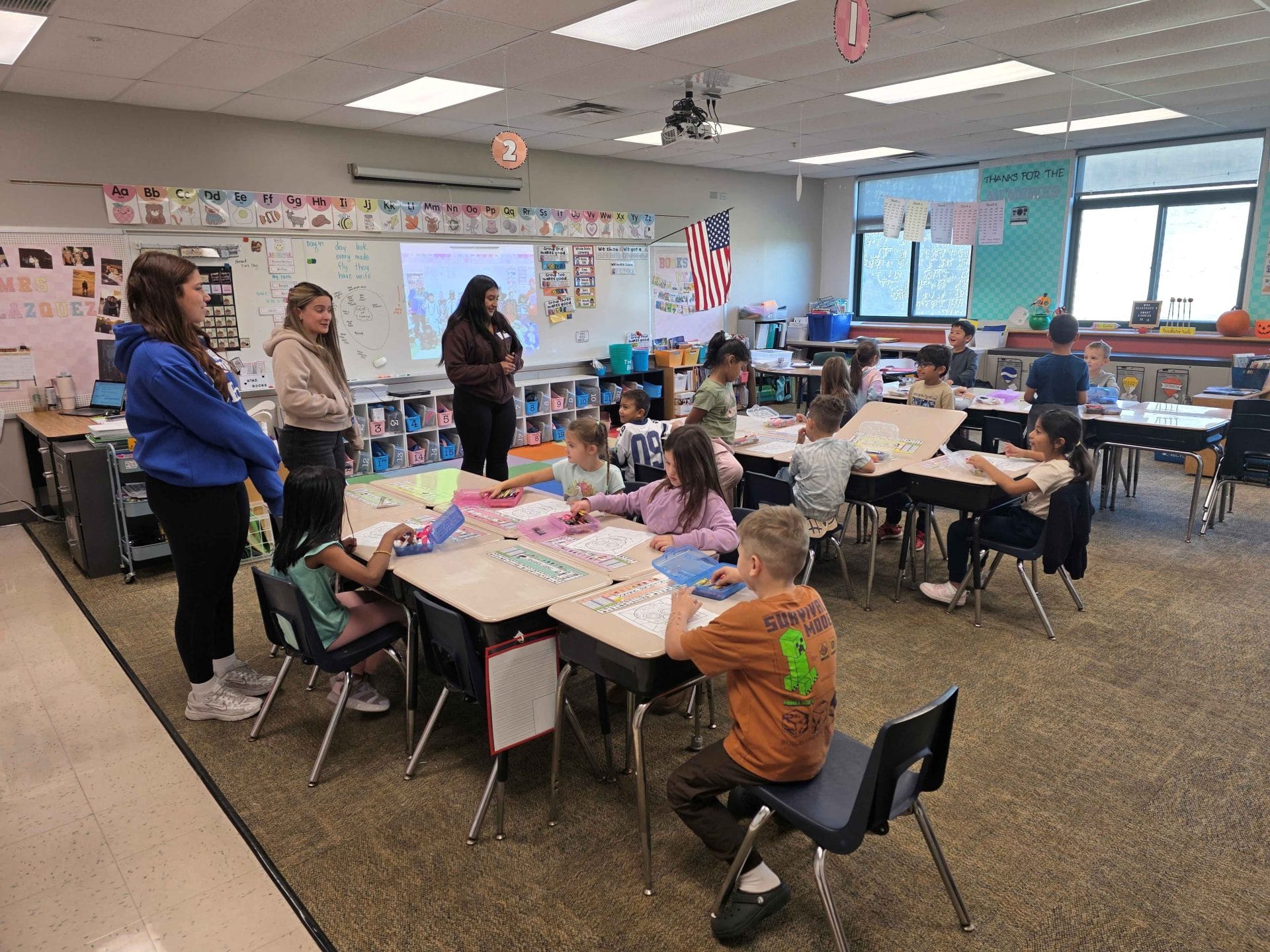 HS and 1st graders work on craft