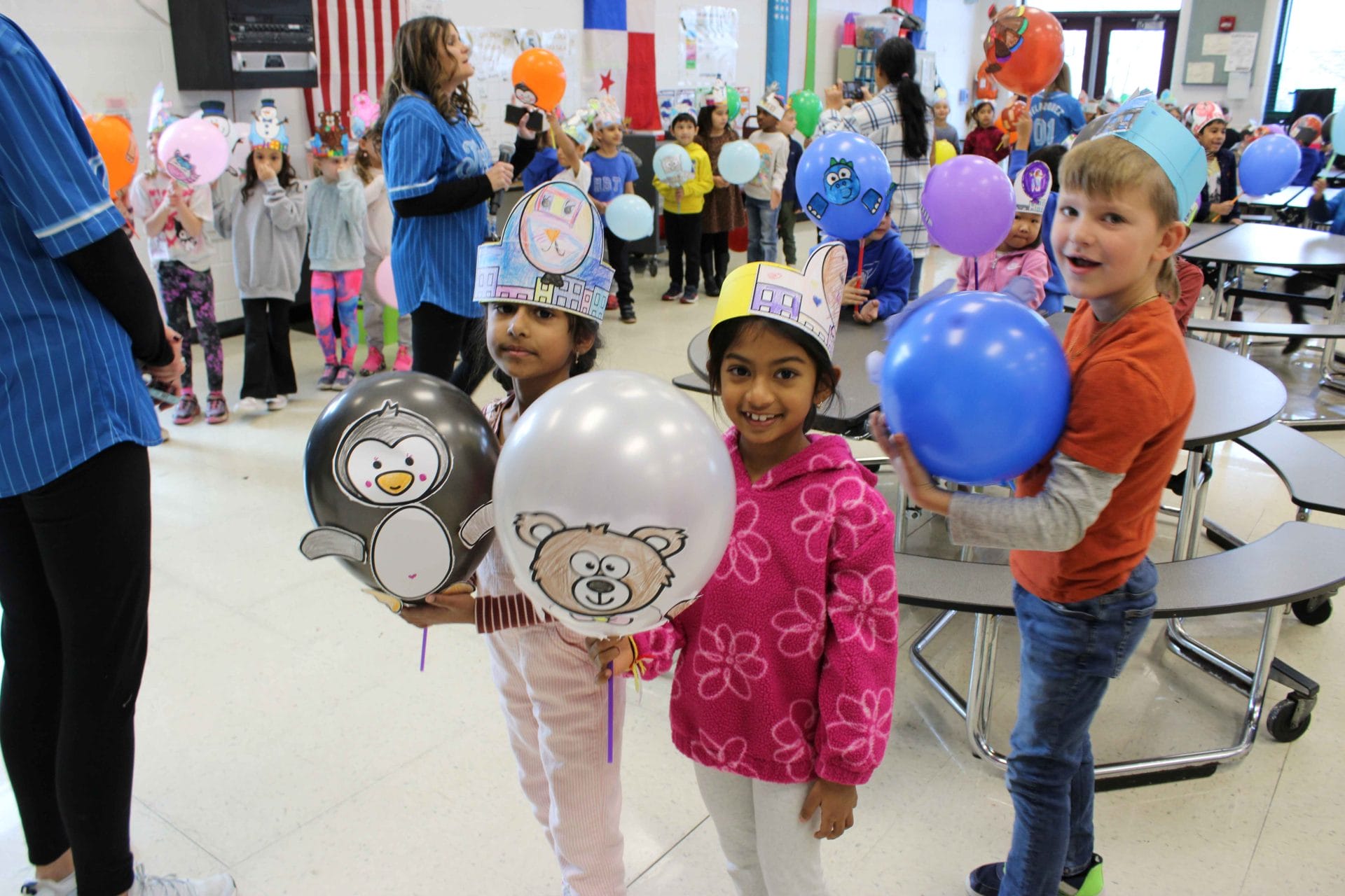 1st graders holding balloons