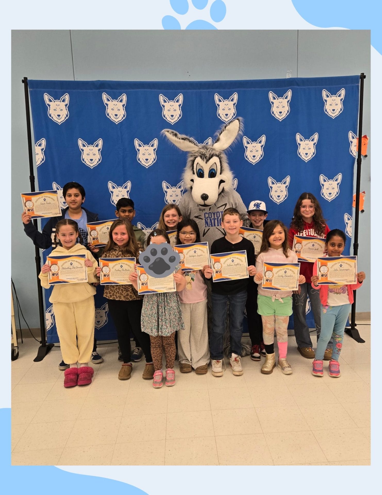 Prairie View students at their coyote of the month ceremony with Hunter