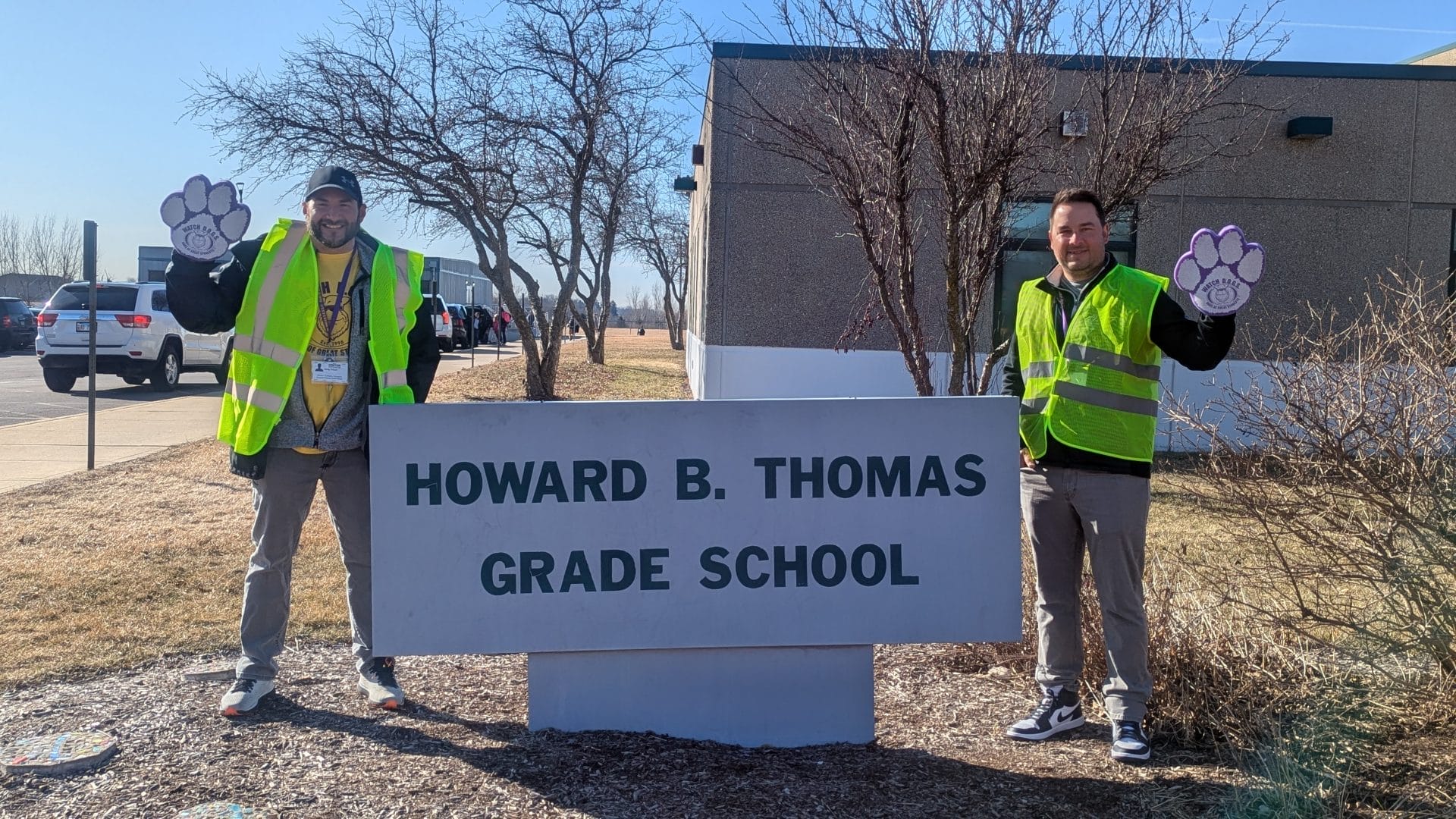 WatchDOGS by school sign