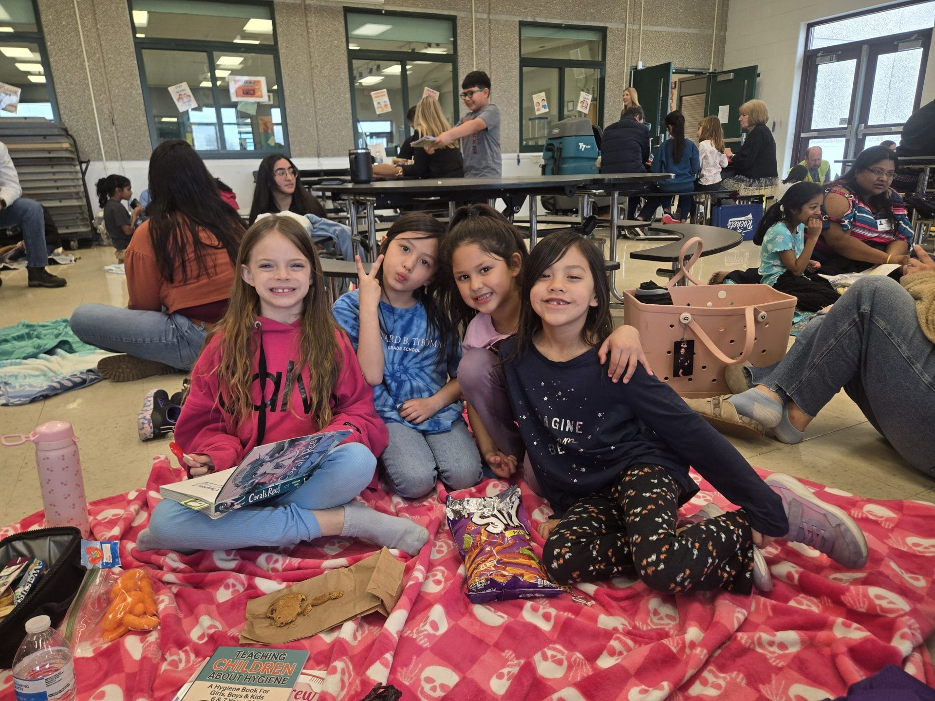 1st graders on a blanket