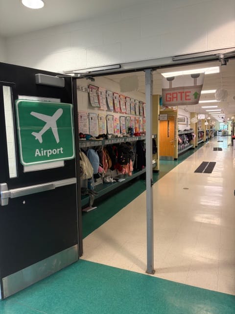 Walking through the fourth grade airport wing!