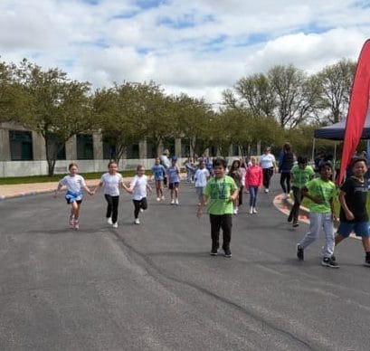 students participating in the fun run