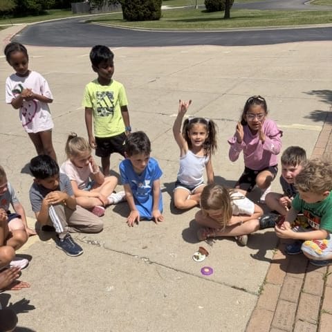 students releasing their butterflies